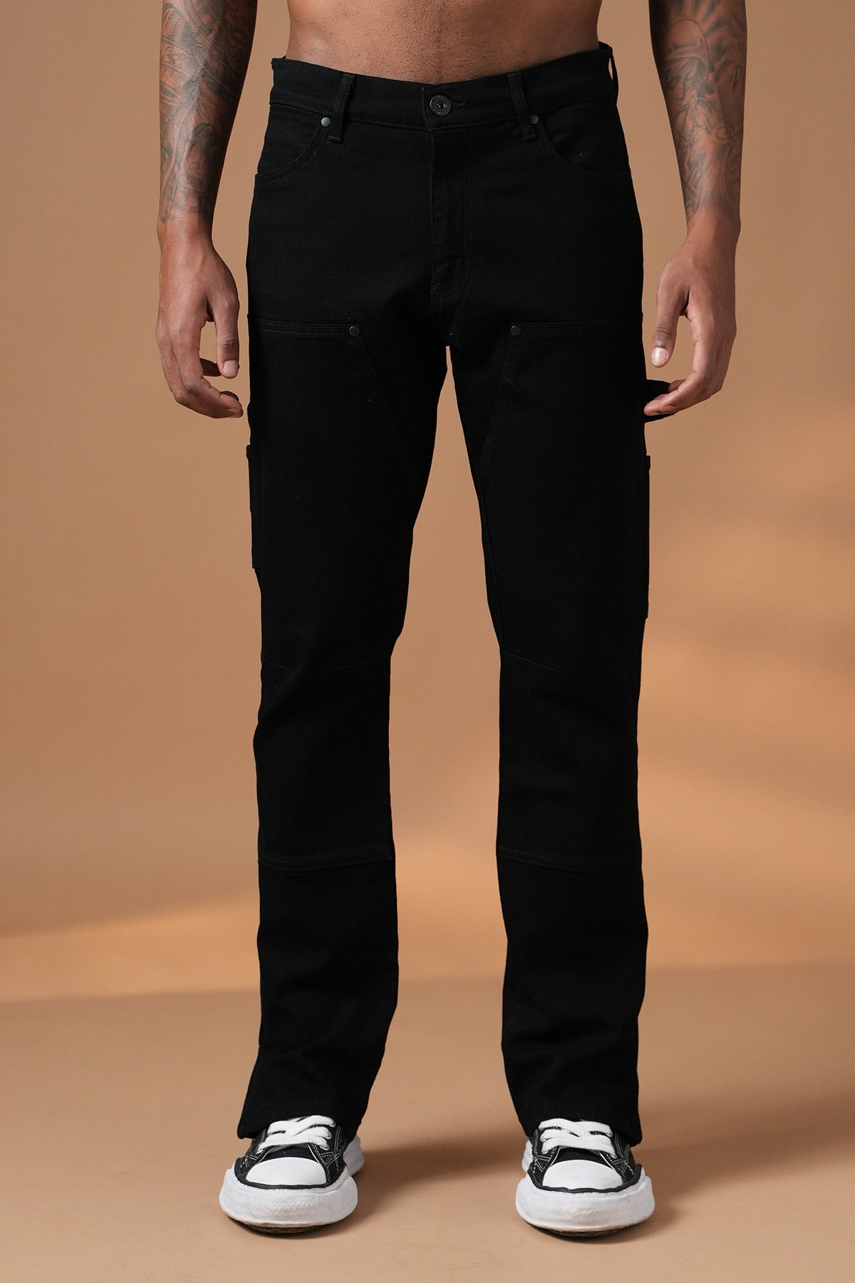 Jean noir avec détails zippés