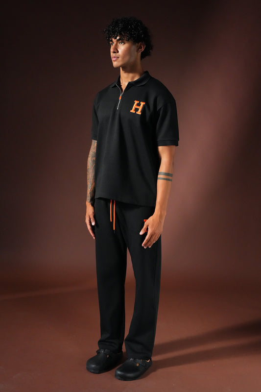 Ensemble « H » Polo Zippé & Pantalon – Noir / Orange